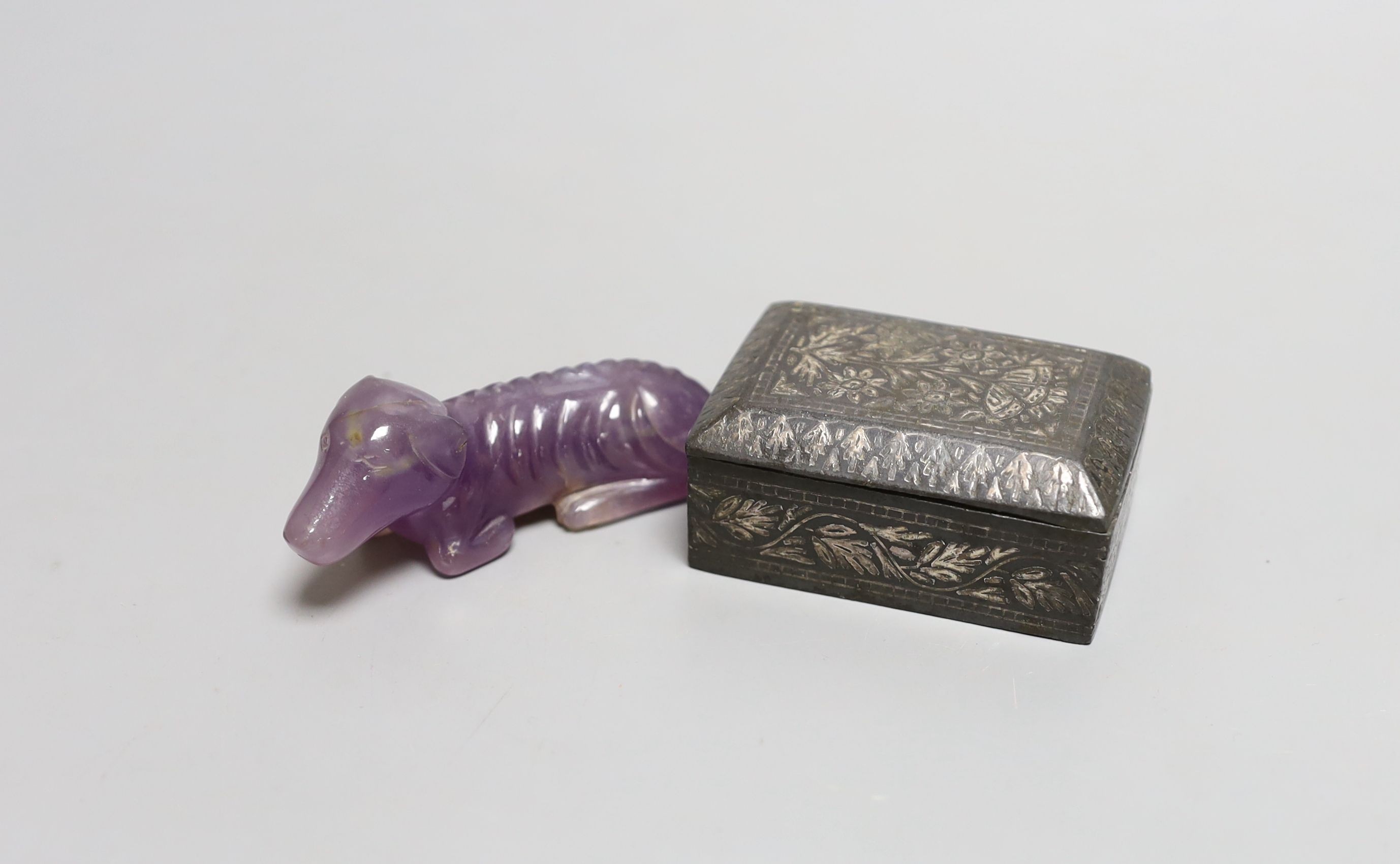 A carved amethyst type dog and a Bidri ware box